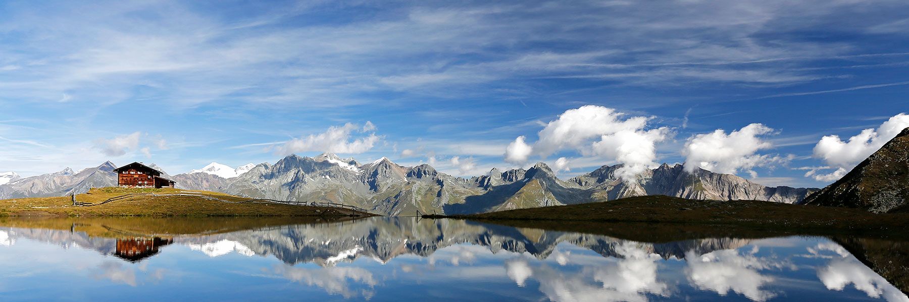 Blick über denm Zupalsee im Virgental bei perfektem Wetter